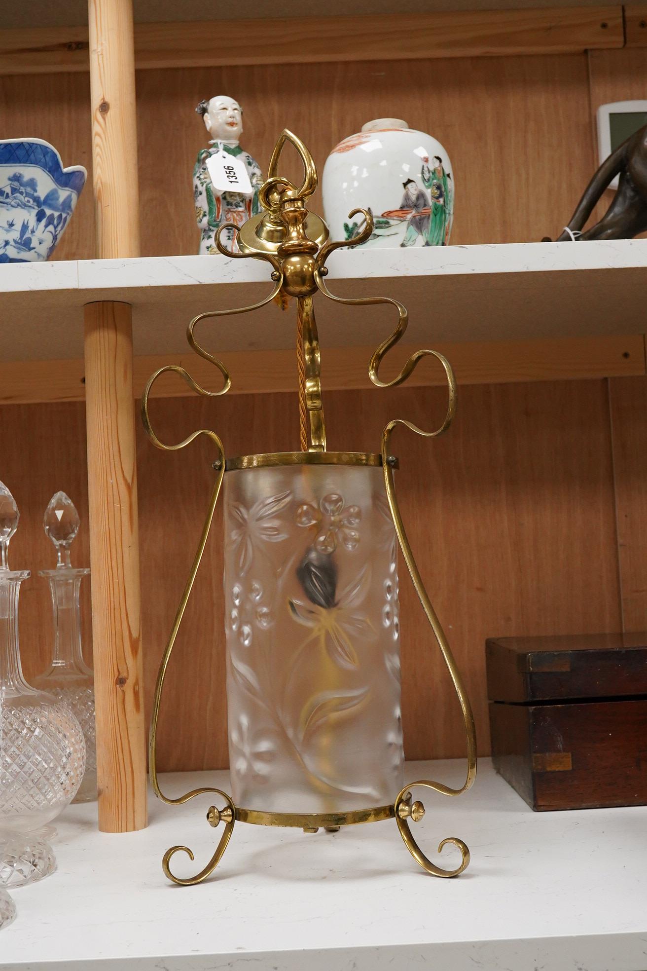 An Art Nouveau frosted glass and a brass hanging lamp, 54cm
